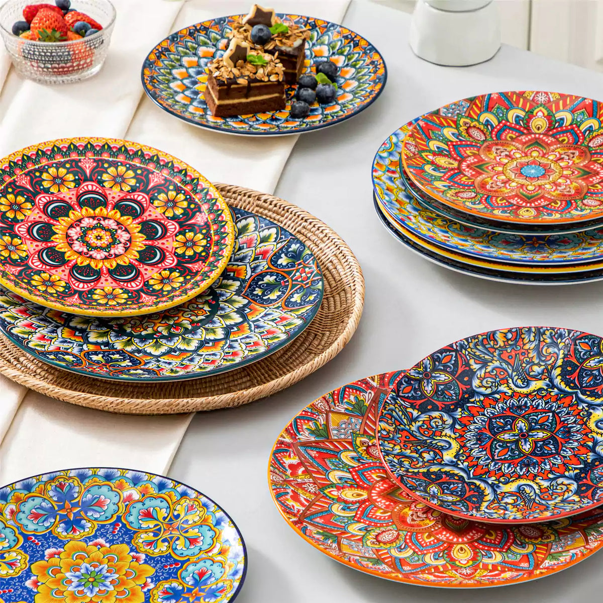 Lumi 8.5" Bohemian salad plate on a white table, featuring a chocolate mousse topped with fresh berries.