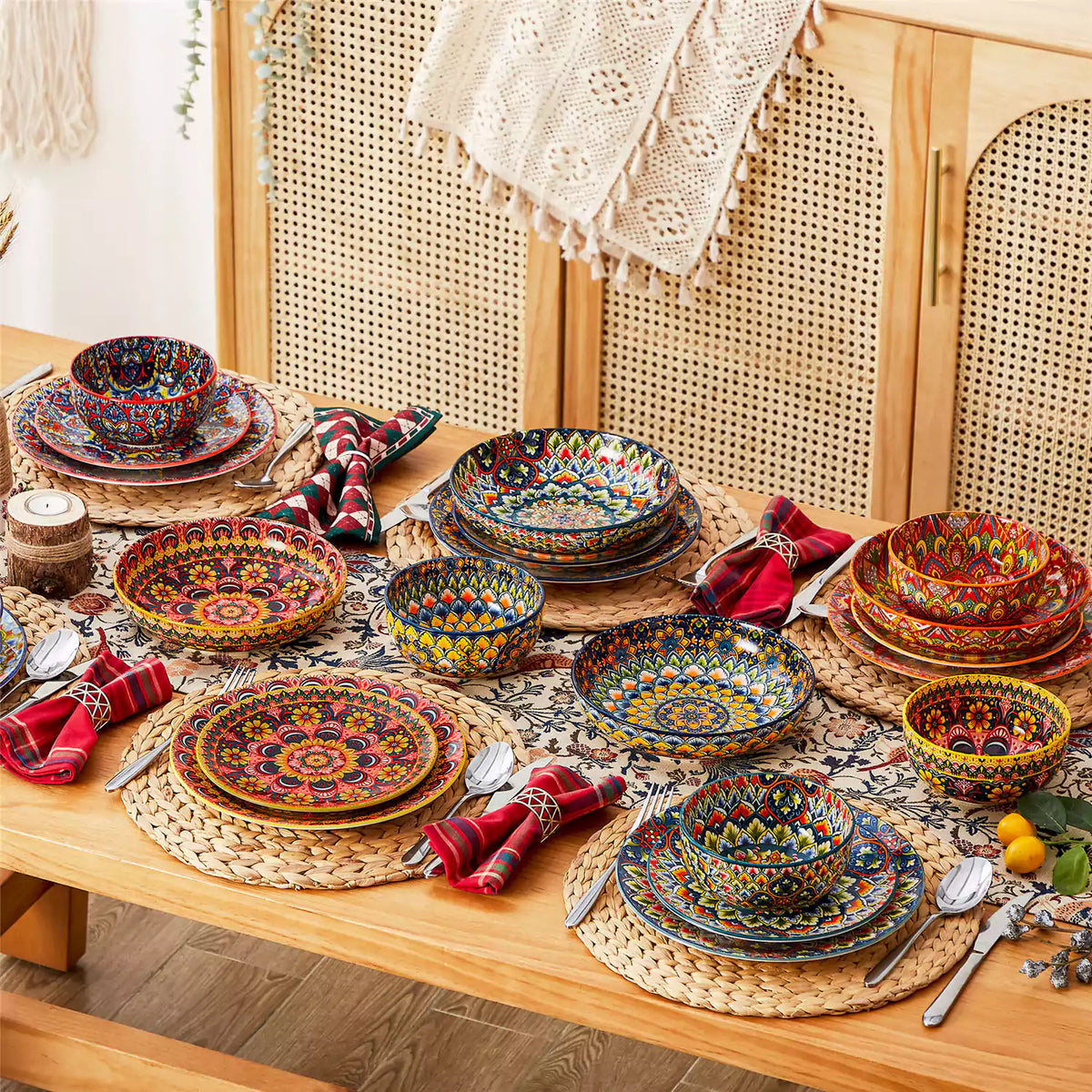 Exotic Lumi 24-piece dinnerware set on a styled bohemian table with a runner, napkins, and wooden incense holder.