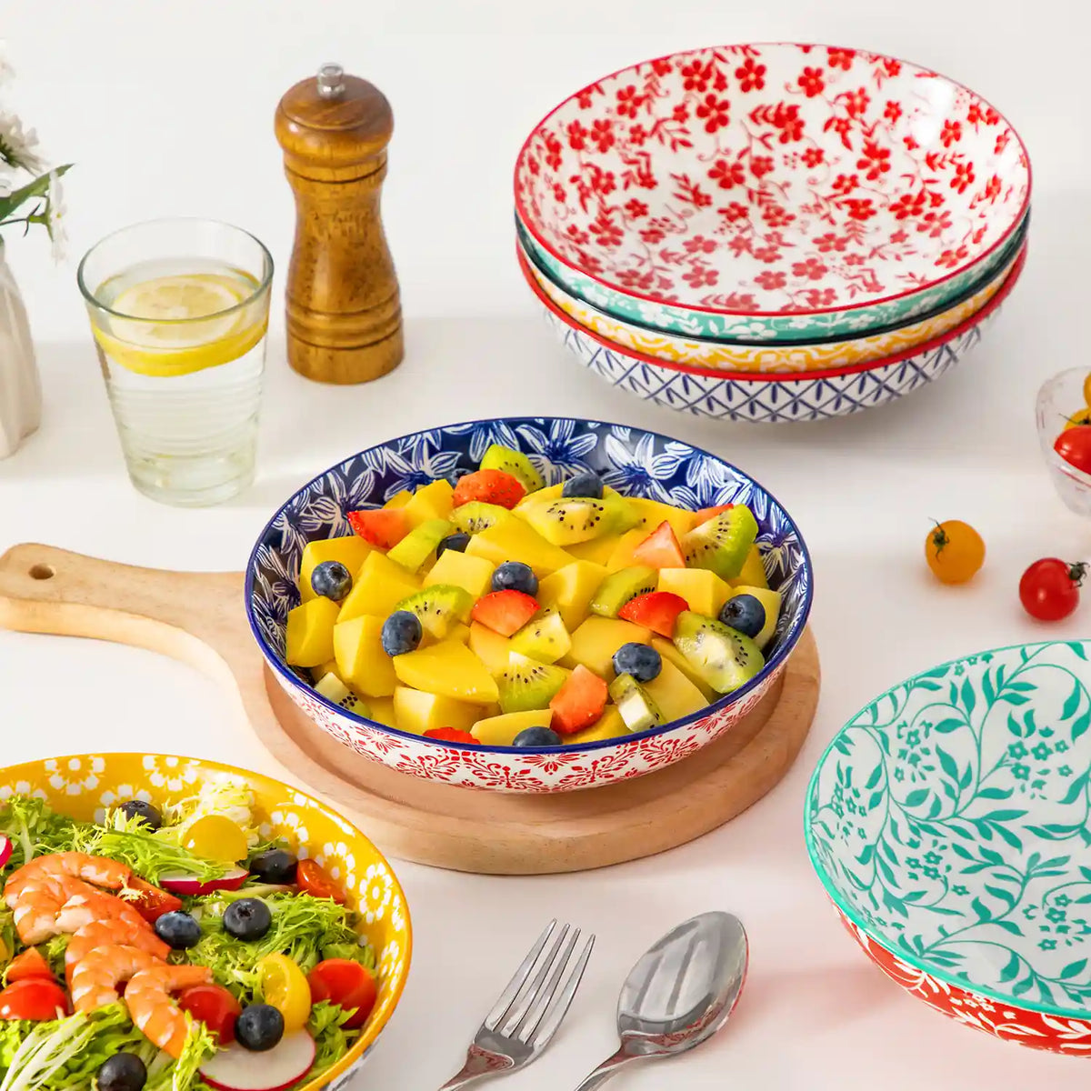 Selene Colorful Porcelain Pasta Bowls Set of 6 with Fruit Salad and Lemon Water on Wooden Tray.