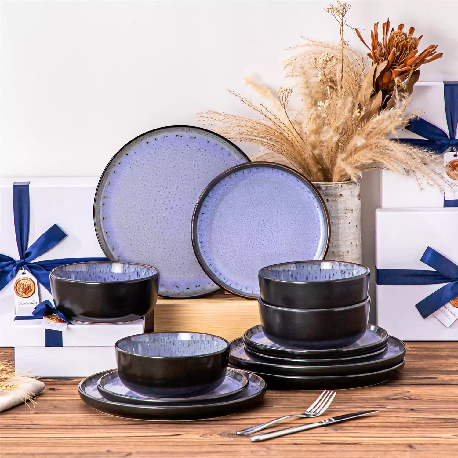Rustic dining table with Amber 12-piece stoneware dinnerware in farmhouse violet - featuring reactive glaze plates - bowls - and utensils by vancasso