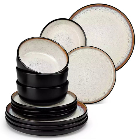 Rustic dining table with Amber 12-piece stoneware dinnerware in farmhouse beige - featuring reactive glaze plates - bowls - and utensils by vancasso