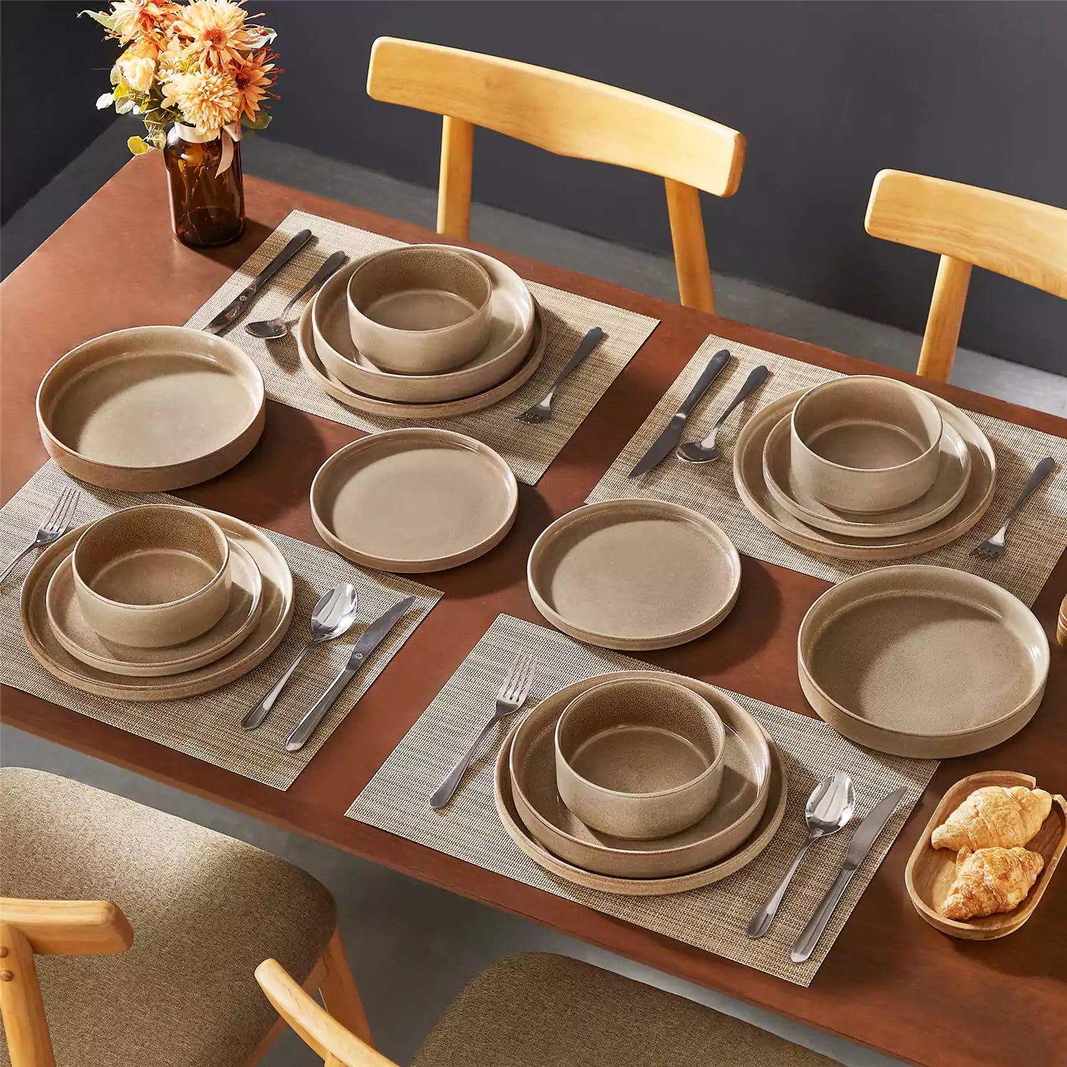 Anya 16 piece straight edge stoneware dinner set in caramel with pasta soup and pastries on a modern farmhouse table