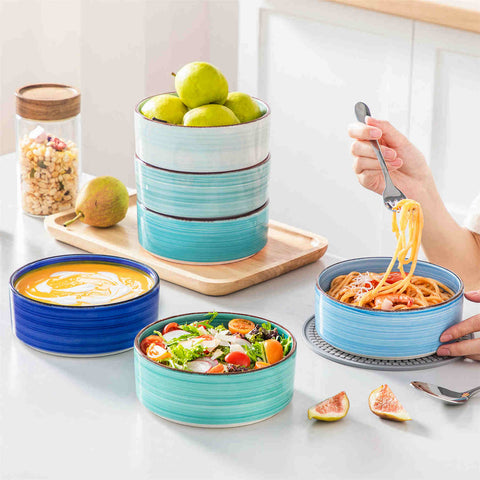 Blue Bonita straight-edge cereal bowls set of 6 on a white table - filled with oats - pear - and pasta - accented with lemons and greenery for a fresh - natural look