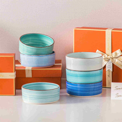 Blue Bonita straight-edge cereal bowls set of 6 on a white table - filled with oats - pear - and pasta - accented with lemons and greenery for a fresh - natural look
