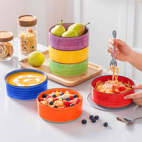 Multicolor Bonita straight-edge cereal bowls set of 6 on a white table - filled with oats - pear - and pasta - accented with lemons and greenery for a fresh - natural look