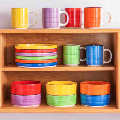 Multicolor Bonita straight-edge cereal bowls set of 6 on a white table - filled with oats - pear - and pasta - accented with lemons and greenery for a fresh - natural look