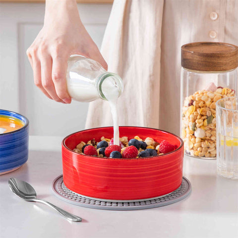 Multicolor Bonita straight-edge cereal bowls set of 6 on a white table - filled with oats - pear - and pasta - accented with lemons and greenery for a fresh - natural look