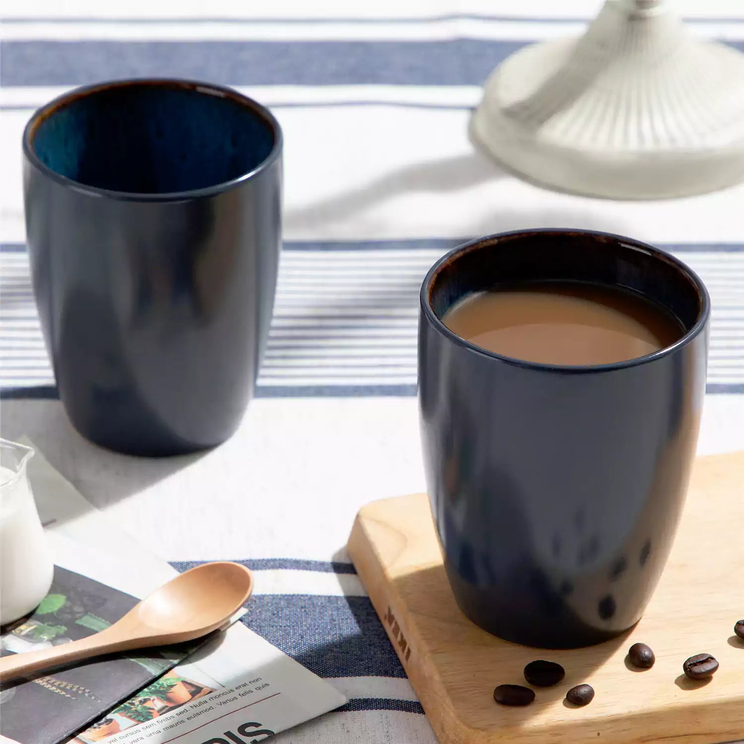 Set of 6 bubble stoneware mugs in rich blue - green - and brown tones with reactive glaze and matte black exterior - ideal for coffee -  tea - or cozy mornings - Blue