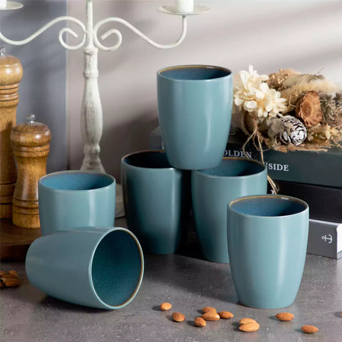 Set of 6 bubble stoneware mugs in rich blue - green - and brown tones with reactive glaze and matte black exterior - ideal for coffee -  tea - or cozy mornings - Green