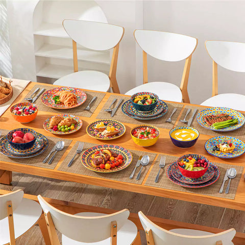 Bohemian Lumi porcelain dinnerware set for 6 with vibrant patterned plates diamond-embossed bowls served with fresh food bread and olive oil on wooden table