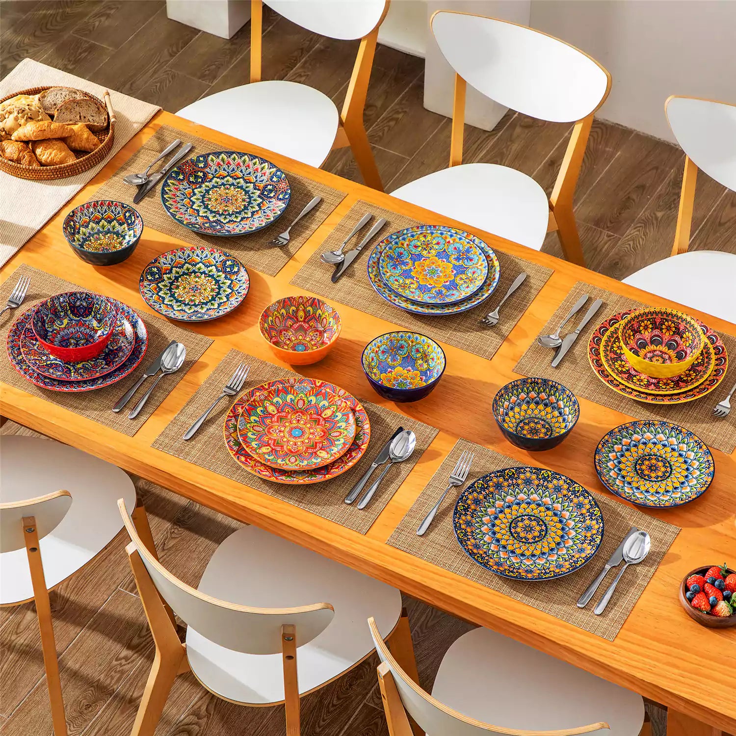 Bohemian Lumi porcelain dinnerware set for 6 with vibrant patterned plates diamond-embossed bowls served with fresh food bread and olive oil on wooden table