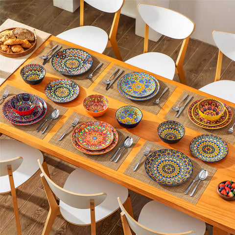 Bohemian Lumi porcelain dinnerware set for 6 with vibrant patterned plates diamond-embossed bowls served with fresh food bread and olive oil on wooden table