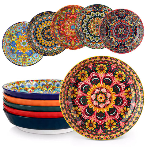Vibrant Boho pasta bowls on a wooden table filled with pasta cherries and persimmons for a colorful, casual dining setting