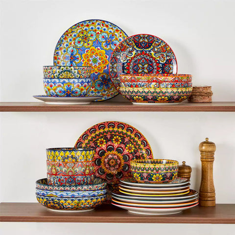 Bohemian style dining table set with Lumi 24 piece colorful dinnerware bowls and vibrant table décor ready for a lively meal