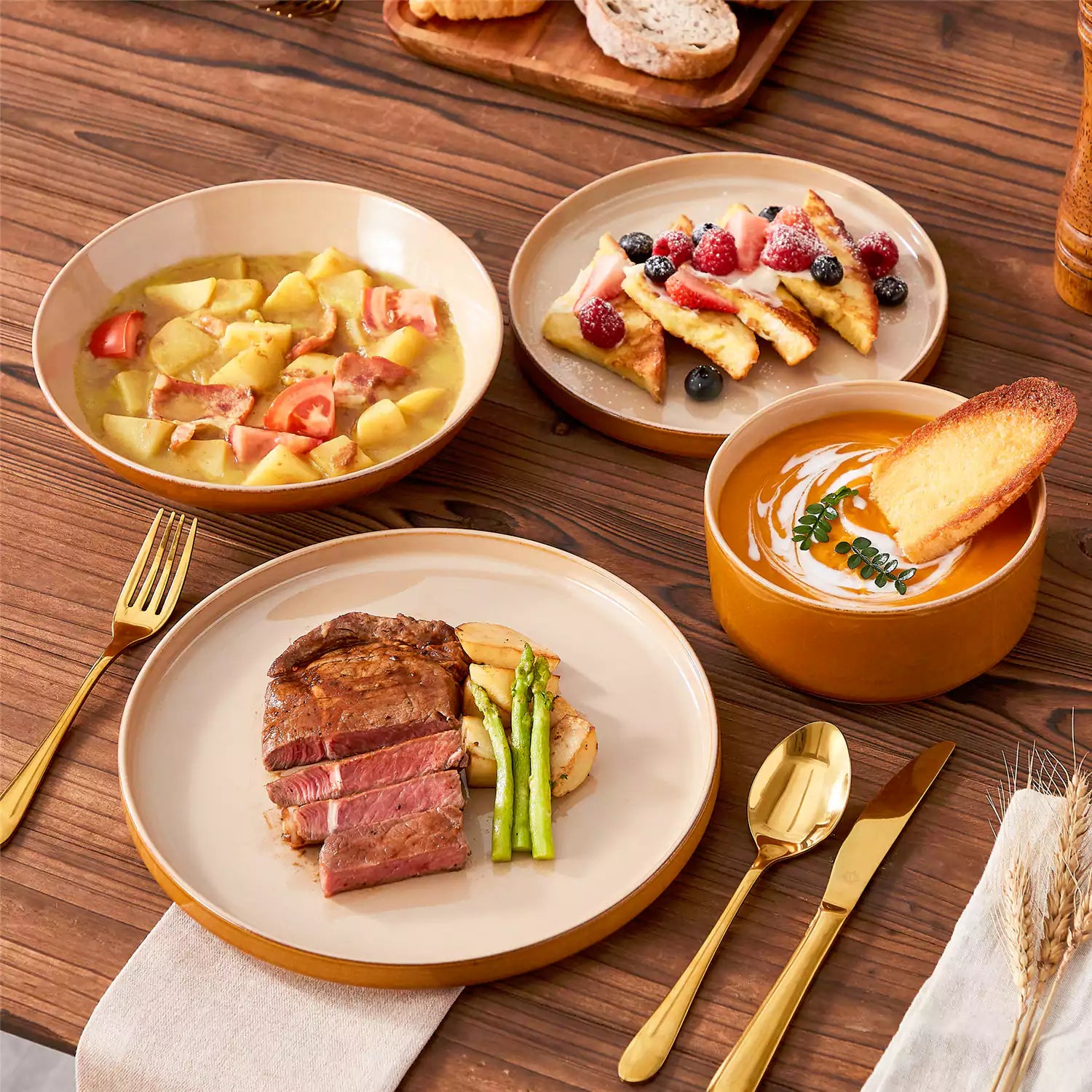 Assorted family dinnerware on wooden table brown stoneware soup bowl pasta with shrimp fruit tart and bread perfect for everyday meals