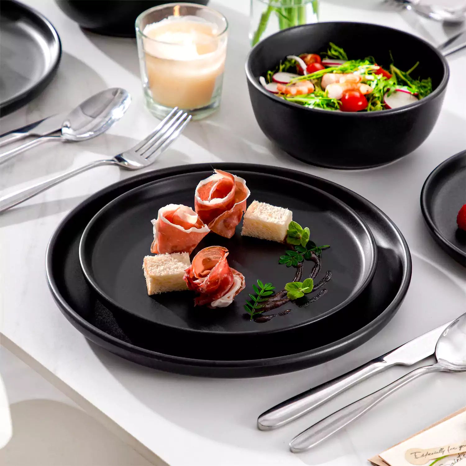 Playa 36 Piece Matte Black Dinnerware Set for 12 ideal for hosting elegant dinners or everyday modern dining.