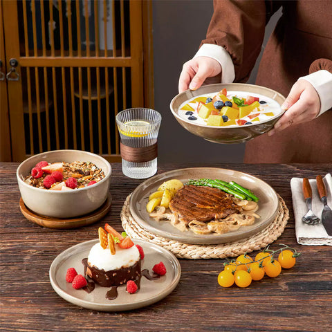 A glossy brown 16-piece stoneware dinnerware set from the Playa collection - featuring farmhouse charm with plates and bowls for 4 people-vancasso
