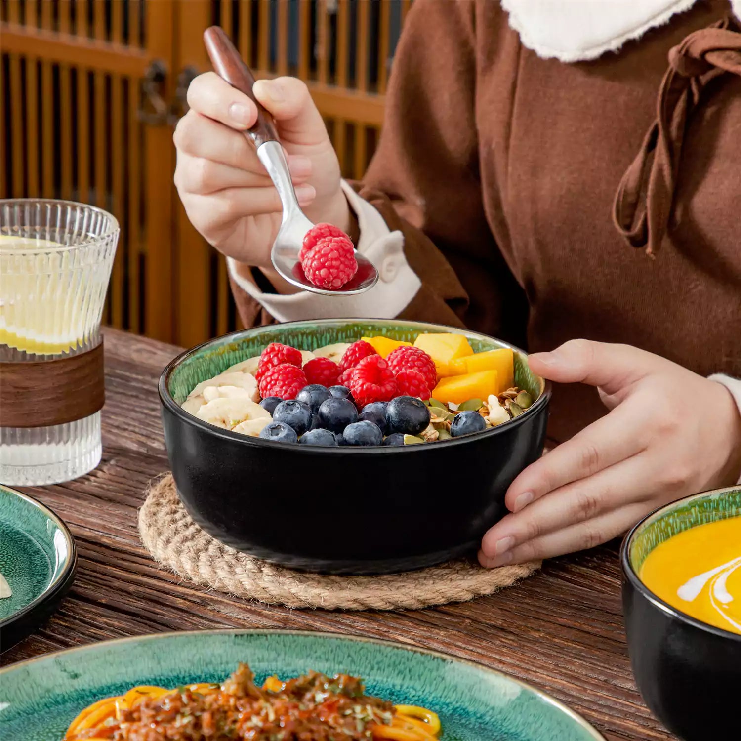 Playa 18-Piece Stoneware Dinnerware Set with plates and bowls for 6 - featuring a unique green reactive glaze and a farmhouse-inspired style-vancasso