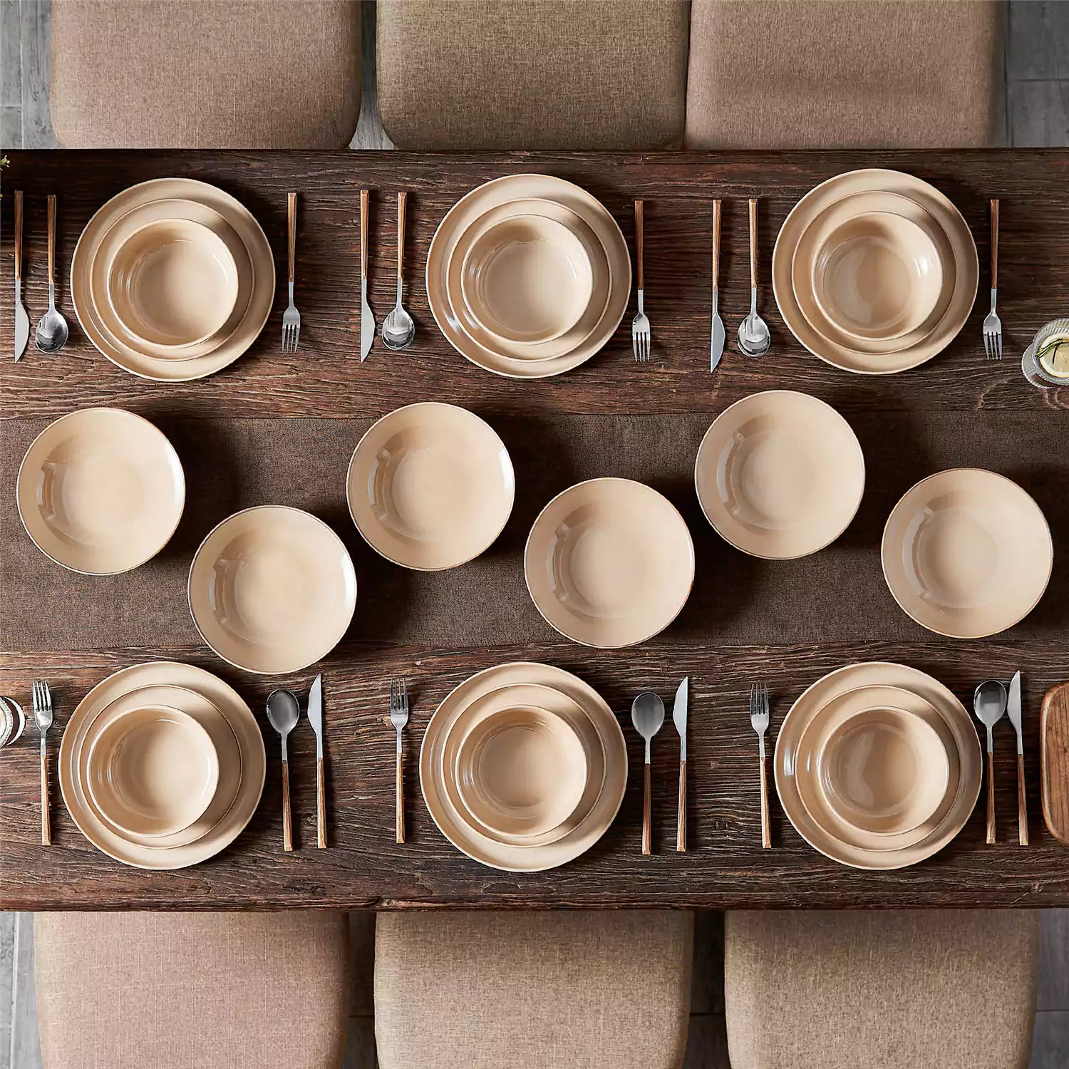 A glossy caramel 24-piece stoneware dinnerware set from the Playa collection - featuring farmhouse charm with plates and bowls for 6 people-vancasso