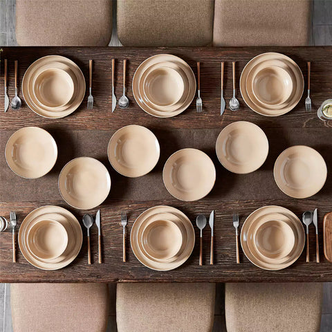 A glossy caramel 24-piece stoneware dinnerware set from the Playa collection - featuring farmhouse charm with plates and bowls for 6 people-vancasso