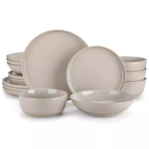 A glossy grey 16-piece stoneware dinnerware set from the Playa collection - featuring farmhouse charm with plates and bowls for 4 people-vancasso