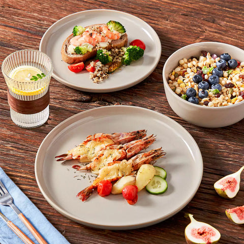 Playa 18-Piece Stoneware Dinnerware Set with plates and bowls for 6 - featuring a unique grey reactive glaze and a farmhouse-inspired style-vancasso