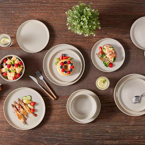 Playa 18-Piece Stoneware Dinnerware Set with plates and bowls for 6 - featuring a unique grey reactive glaze and a farmhouse-inspired style-vancasso