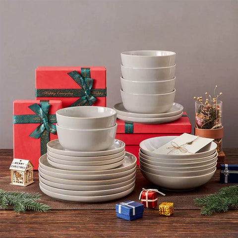 A glossy grey 24-piece stoneware dinnerware set from the Playa collection - featuring farmhouse charm with plates and bowls for 6 people-vancasso