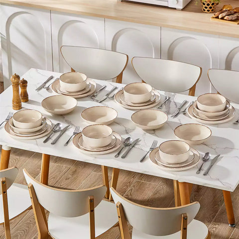 Plays 24-piece stoneware dinnerware set with pasta - soup - and fruit waffle on marble table - featuring sandy speckled plates and bowls with brown rims-vancasso
