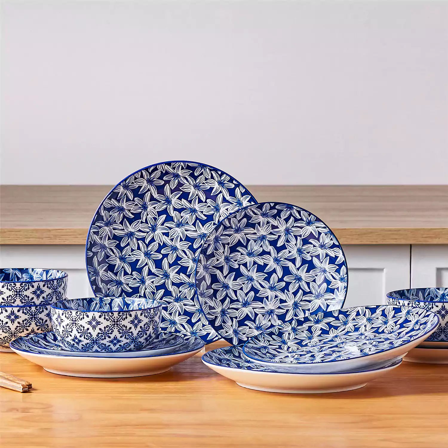 Selene 12-Piece Porcelain Dinnerware Set with blue and white Lily pattern and Japanese-inspired design - including matching plates and bowls-vancasso
