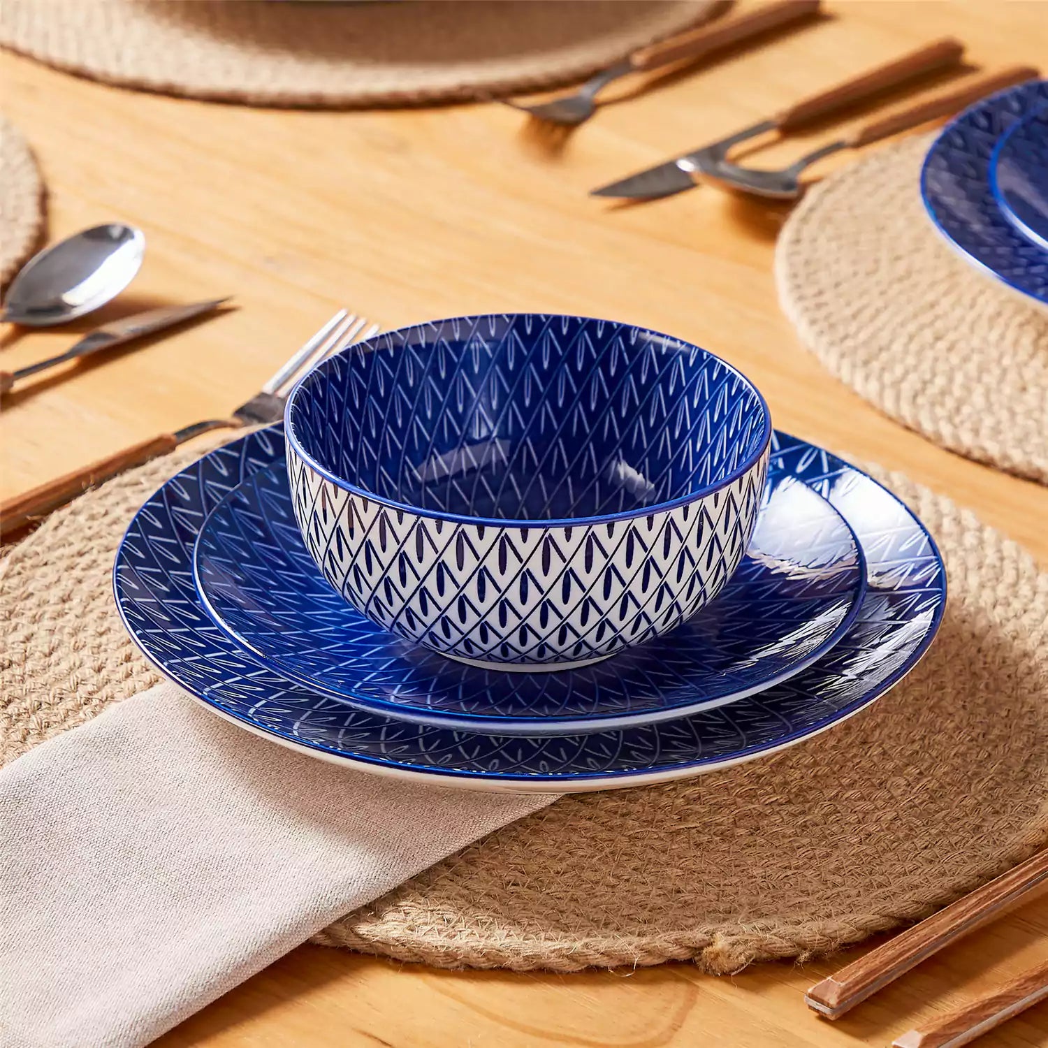 Selene 12-Piece Porcelain Dinnerware Set with blue and white Flame pattern and Japanese-inspired design - including matching plates and bowls-vancasso