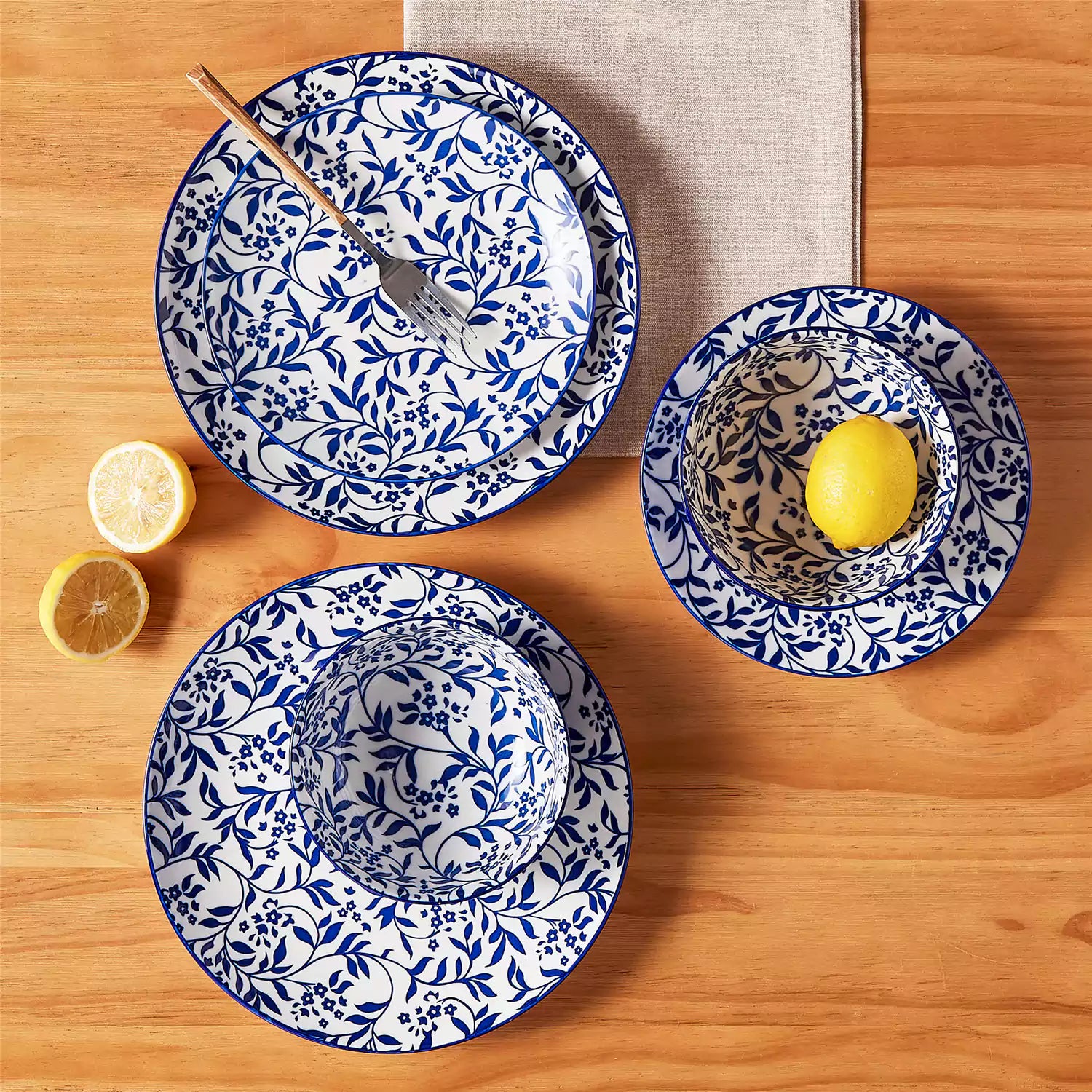 Selene 12-Piece Porcelain Dinnerware Set with blue and white Vine pattern and Japanese-inspired design - including matching plates and bowls-vancasso