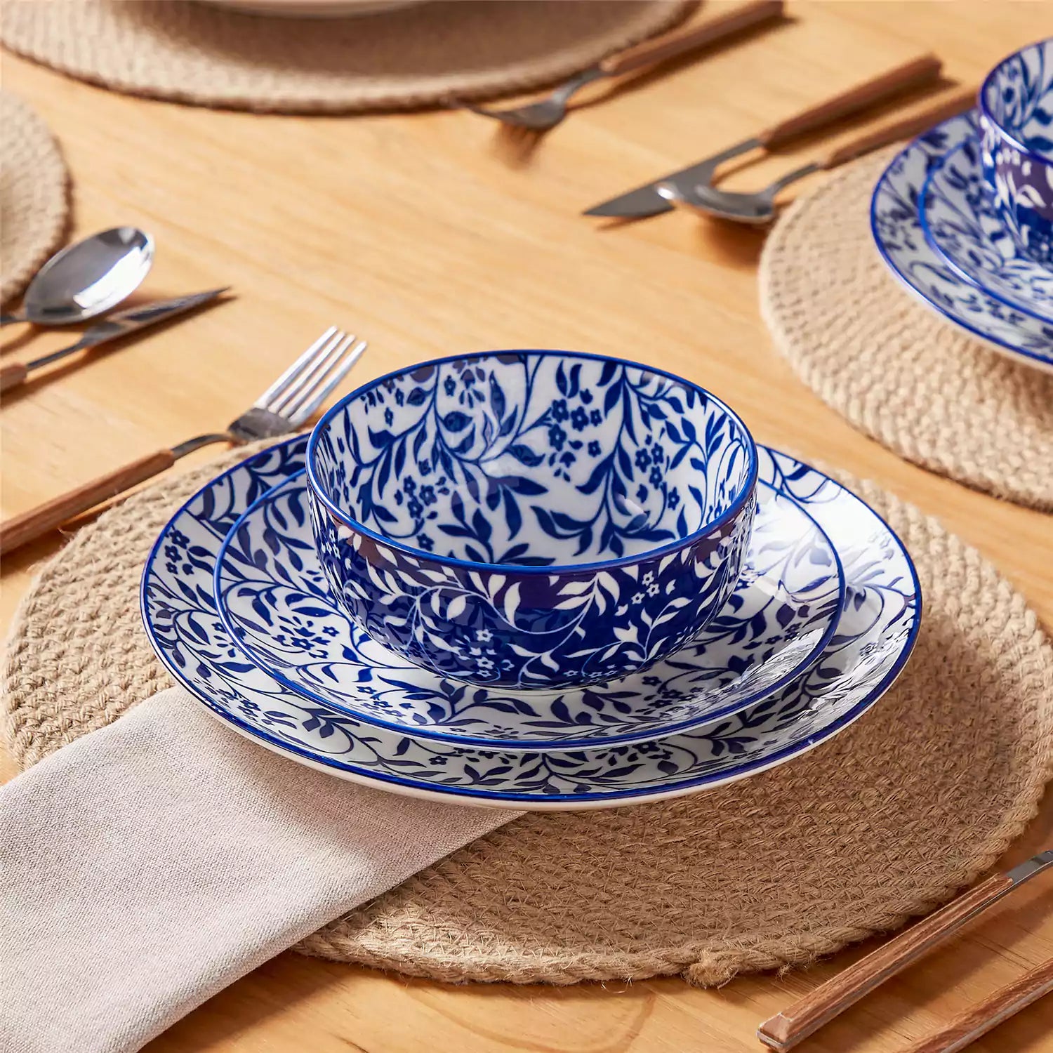 Selene 12-Piece Porcelain Dinnerware Set with blue and white Vine pattern and Japanese-inspired design - including matching plates and bowls-vancasso