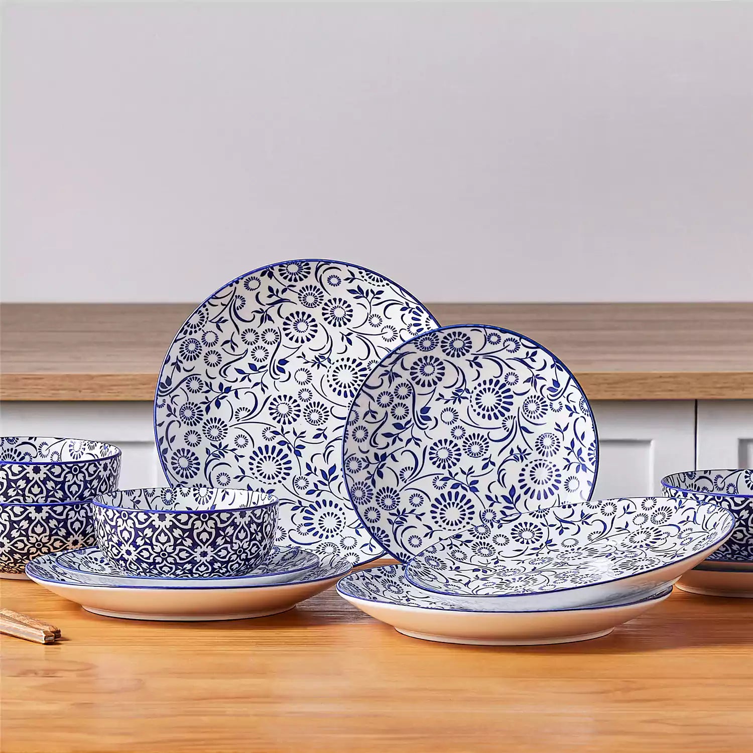 Selene 12-Piece Porcelain Dinnerware Set with blue and white Sol pattern and Japanese-inspired design - including matching plates and bowls-vancasso