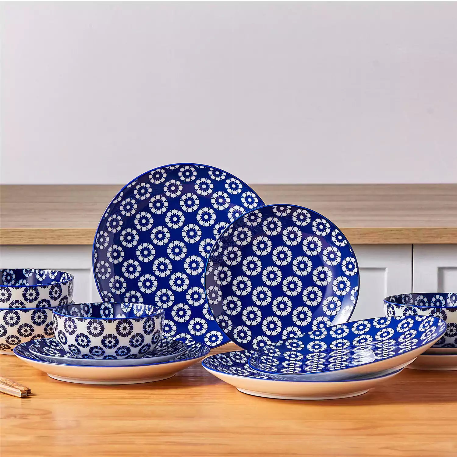 Selene 12-Piece Porcelain Dinnerware Set with blue and white Daisy pattern and Japanese-inspired design - including matching plates and bowls-vancasso