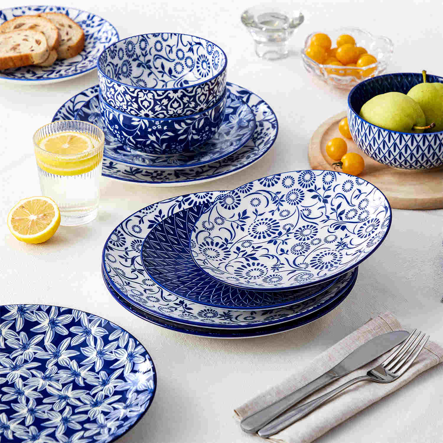 Selene 12-Piece Porcelain Dinnerware Set with blue and white glaze and Japanese-inspired design - including matching plates and bowls-vancasso