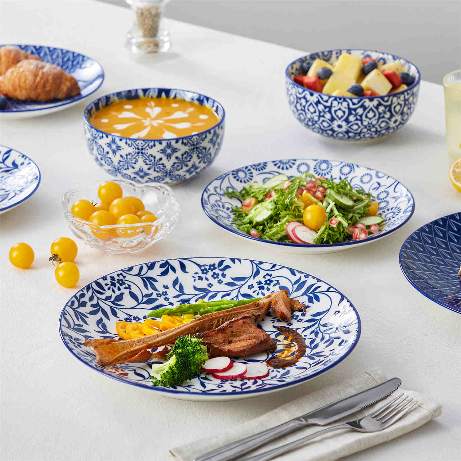 Selene 12-Piece Porcelain Dinnerware Set with blue and white glaze and Japanese-inspired design - including matching plates and bowls-vancasso