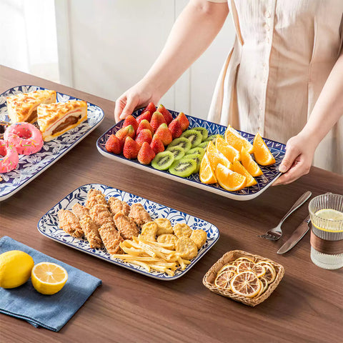 Selene serving platters Set A on dining table with assorted appetizers - fresh fruits - and pastries for elegant entertaining