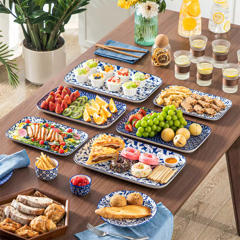 Selene serving platters Set A on dining table with assorted appetizers - fresh fruits - and pastries for elegant entertaining
