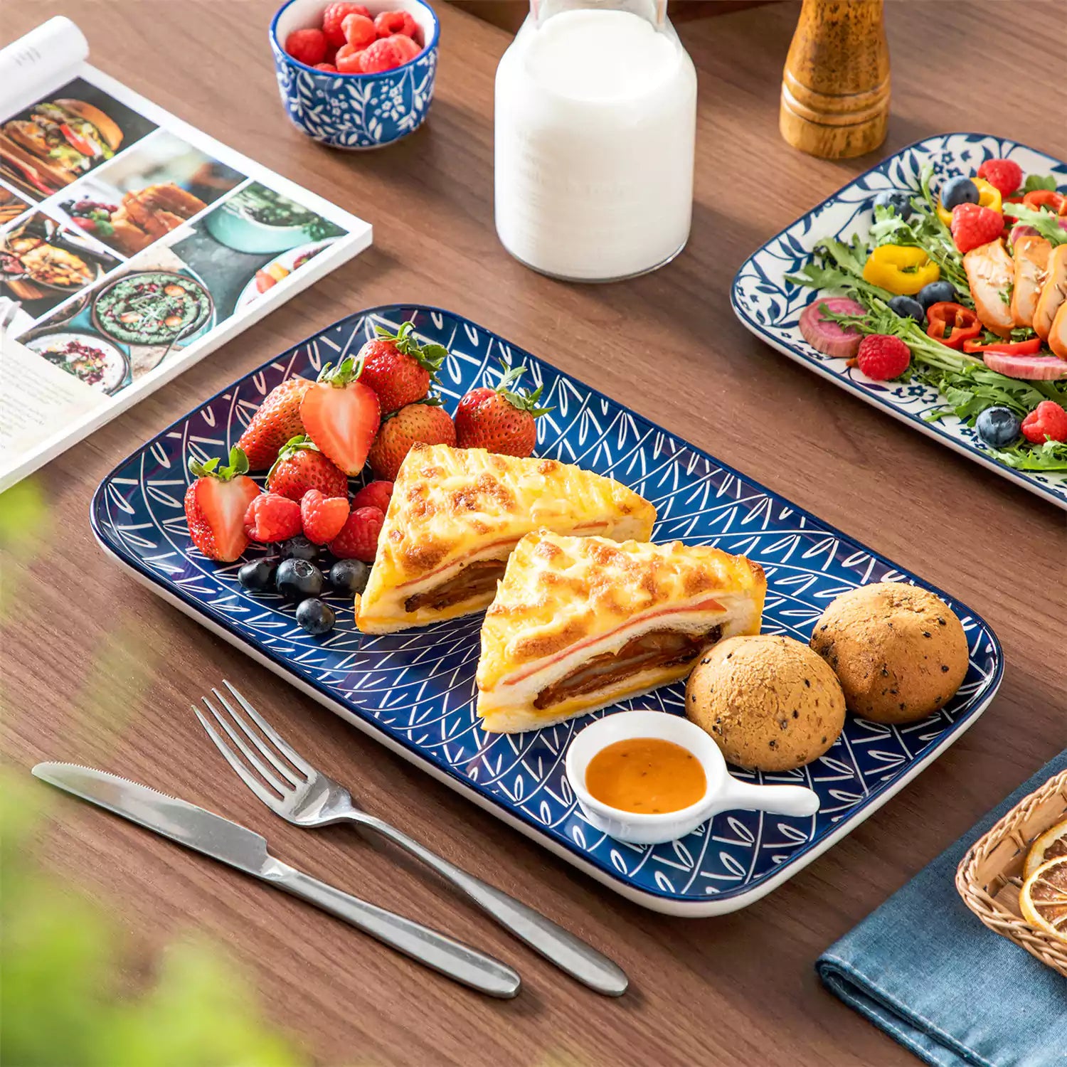 Selene serving platters Set A on dining table with assorted appetizers - fresh fruits - and pastries for elegant entertaining