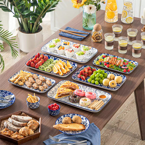 Selene serving platters Set B on dining table with assorted appetizers - fresh fruits - and pastries for elegant entertaining