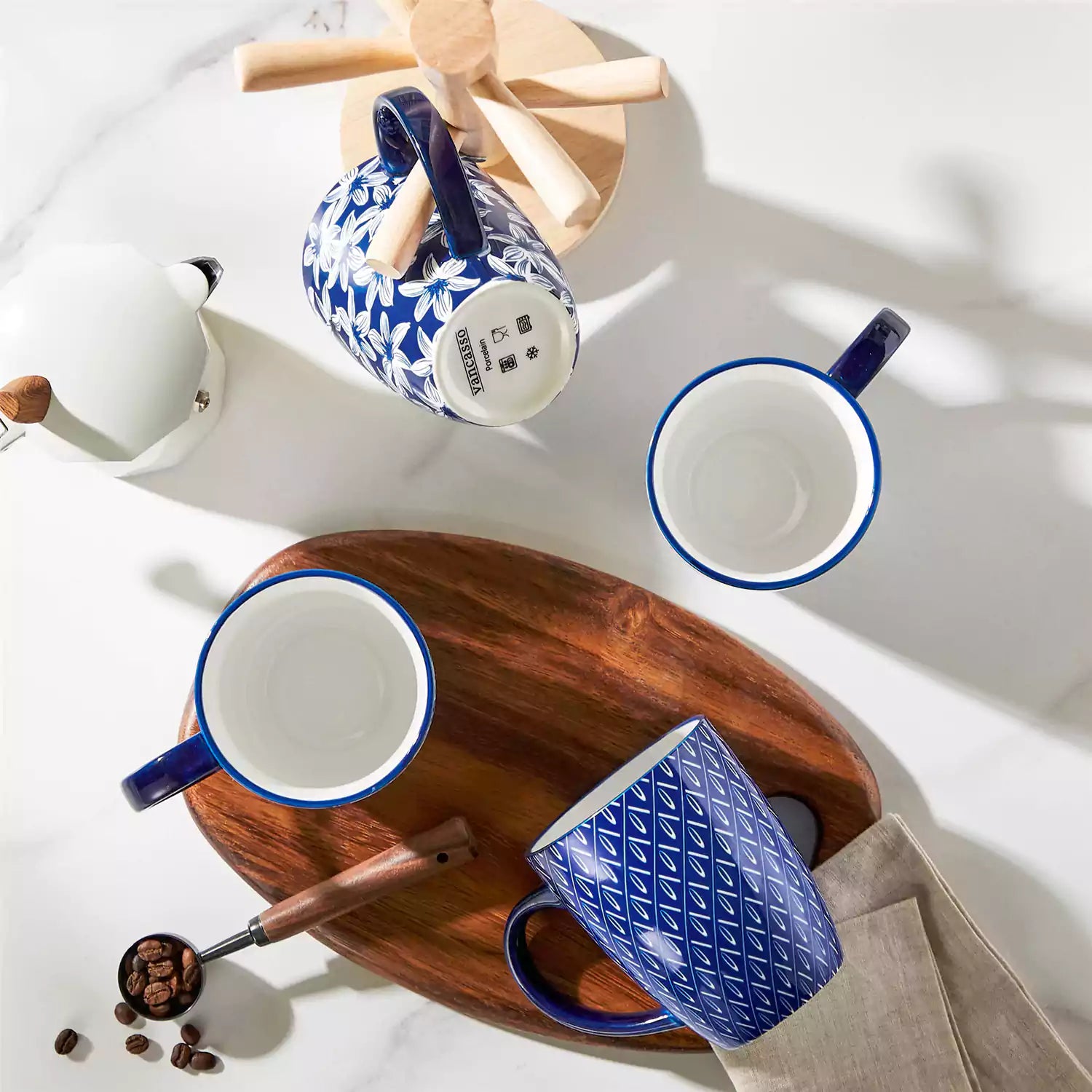 Mix and match Asian inspired porcelain mugs with Japanese indigo patterns on a coffee table
