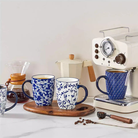 Mix and match Asian inspired porcelain mugs with Japanese indigo patterns on a coffee table