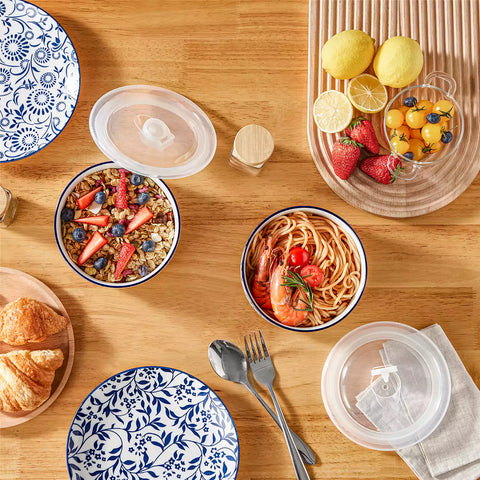 Selene blue-and-white floral porcelain food storage bowls set of 2 styled with fresh fruit and noodles on rustic wood table Japanese-inspired ceramic kitchenware for modern home dining