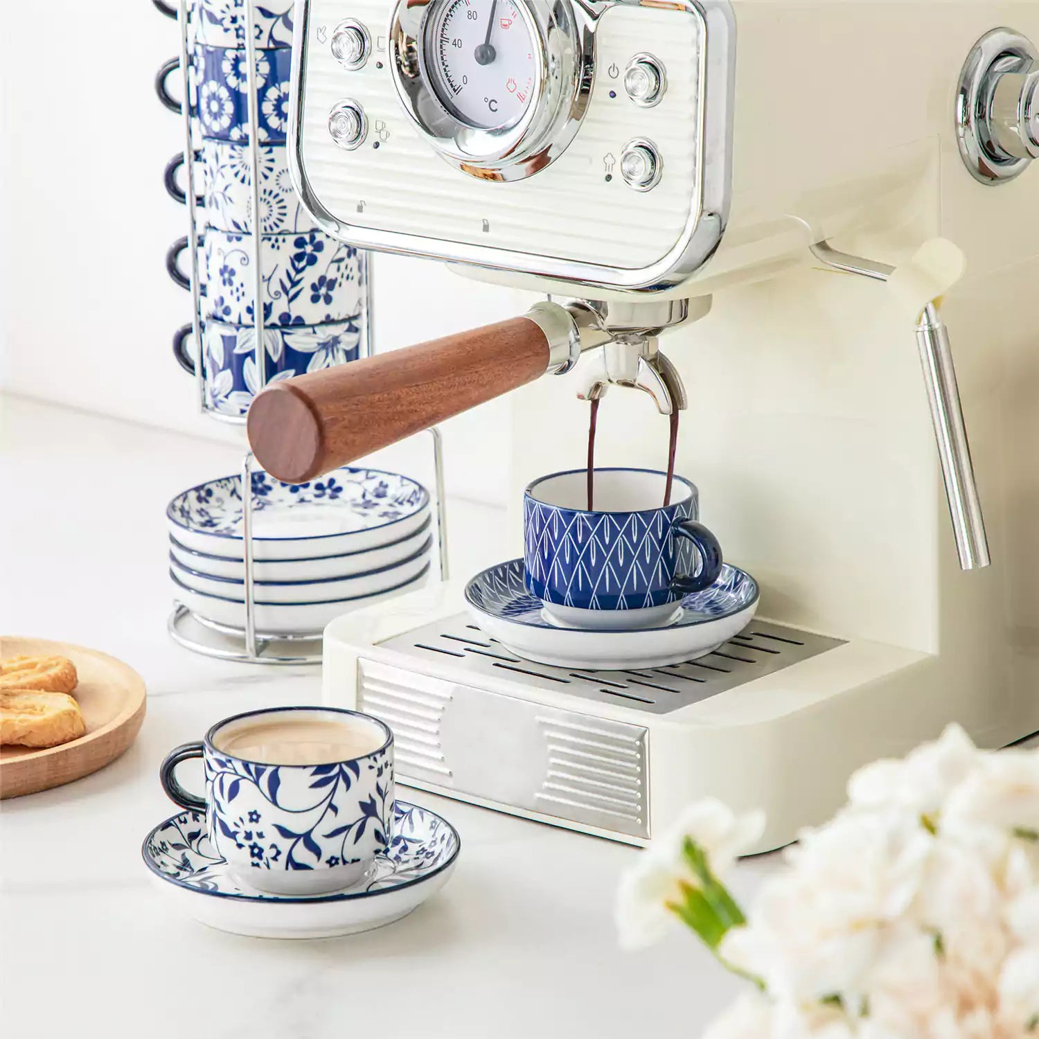 Stackable Selene 3oz blue and white indigo pattern porcelain espresso cups and saucers with a minimalist metal organizer