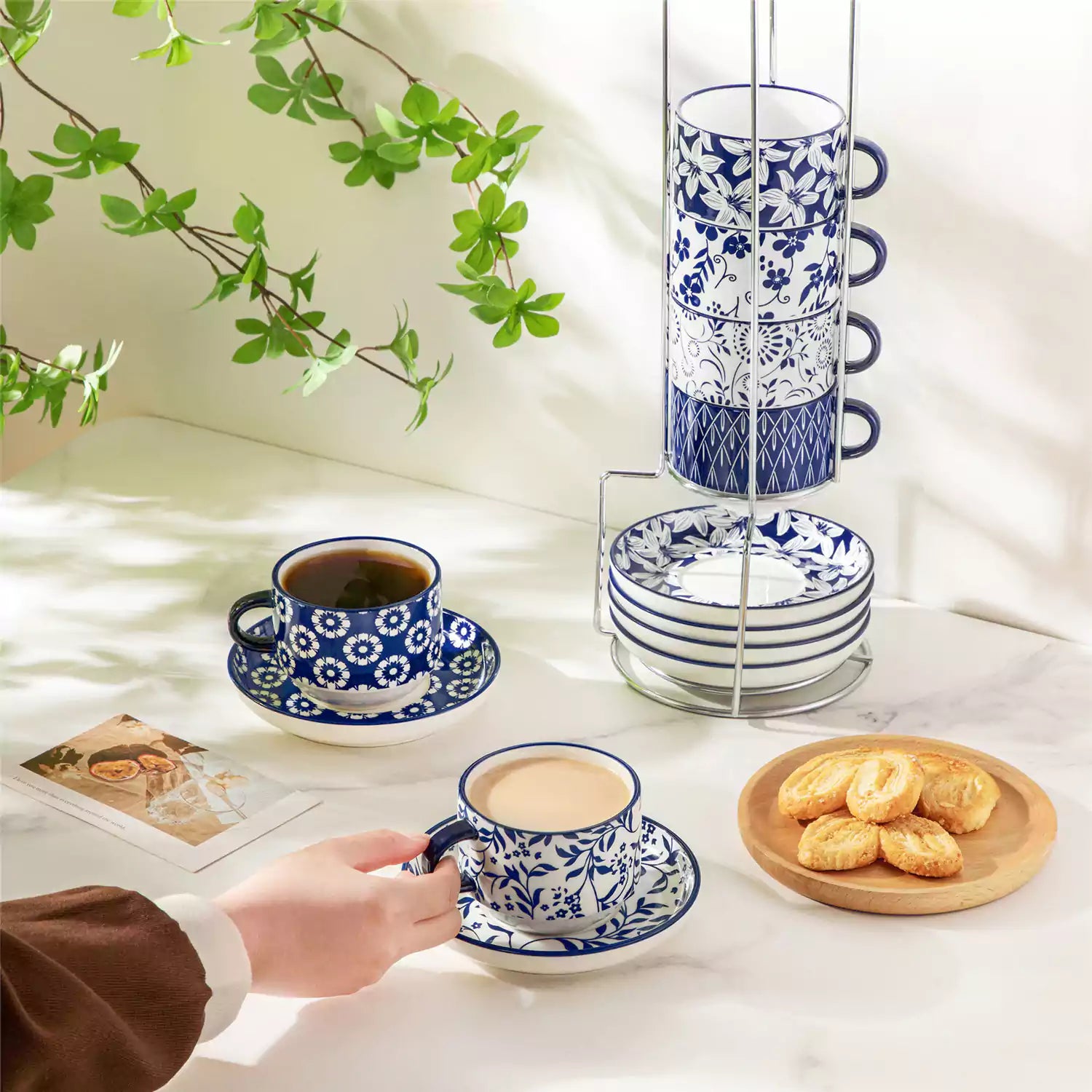 Stackable Selene 9oz blue and white indigo pattern porcelain espresso cups and saucers with a minimalist metal organizer