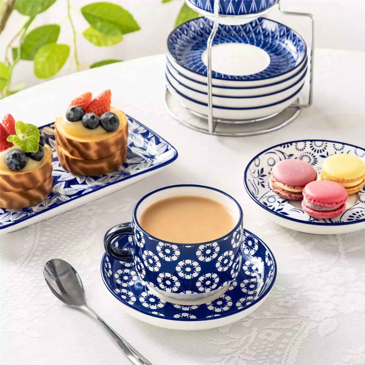 Stackable Selene 9oz blue and white indigo pattern porcelain espresso cups and saucers with a minimalist metal organizer