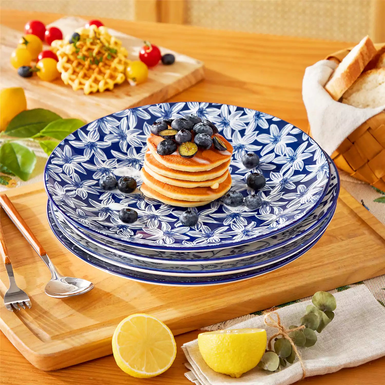 Selene porcelain dinner plates set of 4 styled with pizza and bread on woven placemat mix and match Japanese inspired table setting