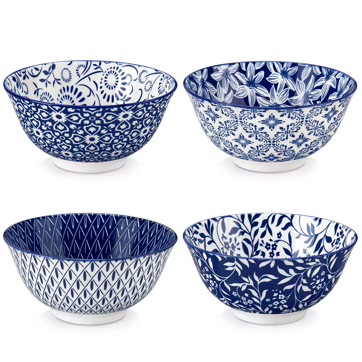 Selene porcelain cereal bowls set of 4 blue and white Japanese inspired floral pattern mix and match tableware styled with fruits and dishes on dining table