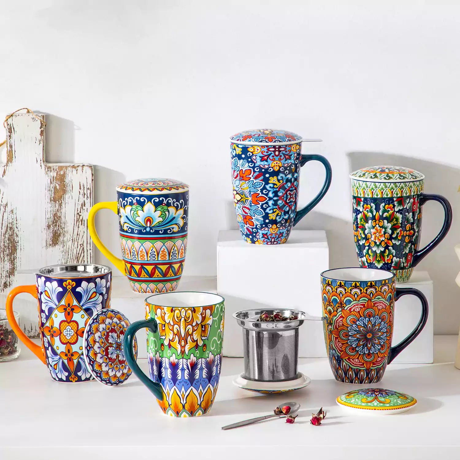Simi tea mug with infuser and lid colorful forest green boho chic ceramic coffee cup with spoon and loose tea leaves on white background 